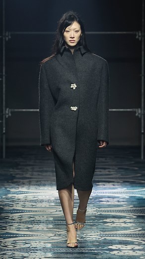 Prada on Instagram: "Fragments of garments shift around the body, liberated from their original function and language. Watch the key looks from the Prada Fall/Winter 2025 Womenswear Show by Miuccia Prada and Raf Simons. #PradaFW25"