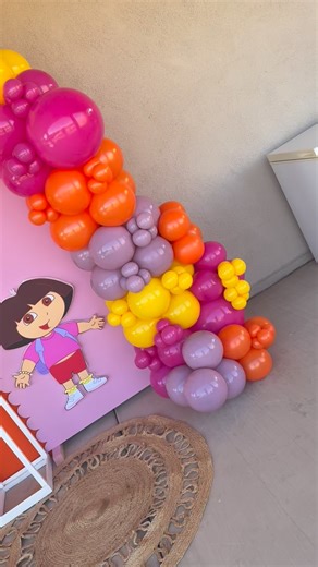 Balloon Decor by Viry 🩷 on Instagram: "Dora the Explorer birthday celebration for sweet Cleo! #birthday #gemarballoons #tuftexballoons #balloongarlands #smallbusiness"