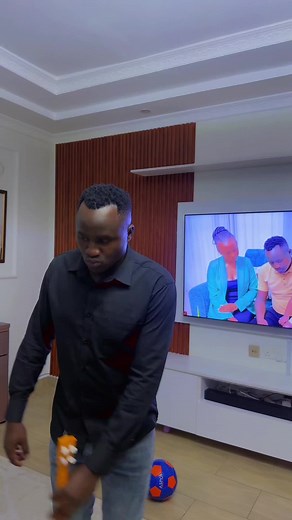 Playing the Orange Ukulele: A Musical Moment