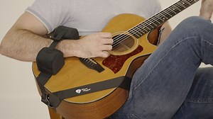 Strum Perfect is a guitar attachment that aims to help beginners learn the art of strumming