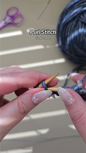 How do you make a purl stitch?