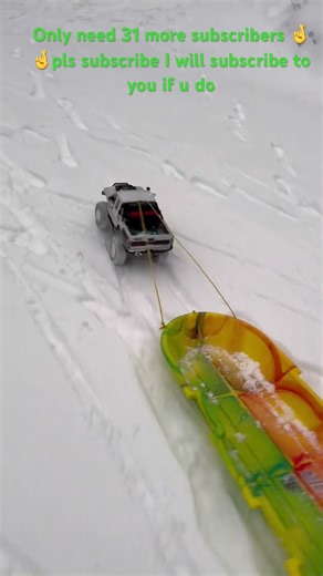 Scx10iii pulling a sled #rccar #wintersports
