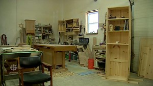 Fredericton-made caskets double as bookshelves until needed | CBC News