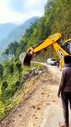 Elephant vs. JCB: Mountain Road Chaos