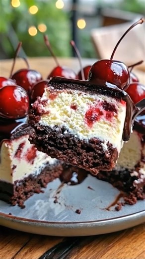 Chocolate Cherry Cheesecake 🍒 I pulled this chocolate cherry cheesecake out of my fridge and honestly just stood there smiling. The creamy vanilla cheesecake, sweet cherry pockets, and that thick chocolate drizzle on top feel so bakery-style and indulgent. It’s the kind of dessert I love making around Valentine’s Day, when chocolate and cherries just feel extra special. Save this one, share it, or tag someone who would absolutely sneak a second slice. Yield: 12 generous slices Ingredients: 1 1/