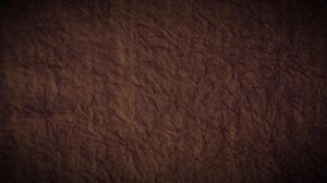 Download A brown paper texture background with some rough edges for free
