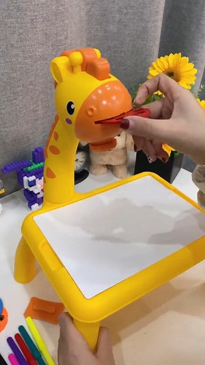 Kimi Gadgets on Instagram: "Turn your child into an artist! This musical doodle board projects drawings to trace and color with included supplies. ✨ Built-in projector and music ✨ Includes markers and slides ✨ Easy for toddlers and preschoolers  Creative play meets early learning Buy Link in Bio   #drawingboardforkids #kidsartkit #creativekids #earlylearningfun #musicaltoysforkids #toddlerplayideas #besthomegadgets"