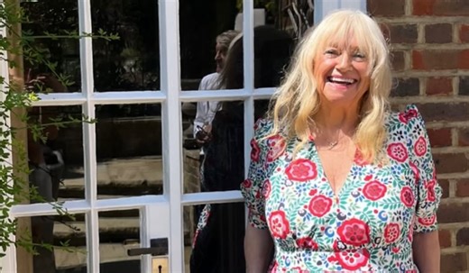 Judy Finnigan glows as she celebrates turning 77