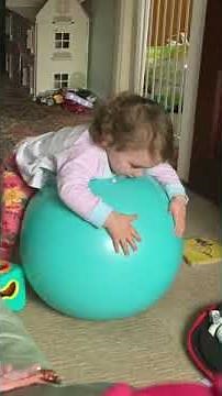 Pearl playing with the space hopper