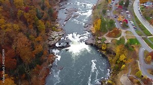 Aerial view of the Ohiopyle Falls in the Fall. Ohiopyle State Park in Pennsylvania on the Youghiogheny river in fall. Youghiogheny River as it cuts through the Laurel Highland mountains
