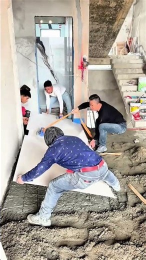 Precision Teamwork Expert Installation of Large Format Floor Tiles