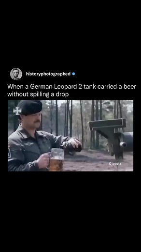 History Photographed on Instagram: "In 1986, Germany showed the Leopard 2 tank’s power, showcasing its firepower and speed. In a bizarre move, a soldier placed a beer-filled stein on the tank’s gun, highlighting its advanced stabilization. The glass stayed steady even in motion, a cool testament to its precision."