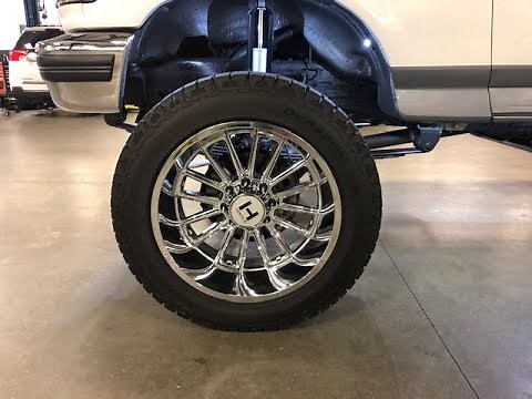 How to fit center caps on an OBS Ford Truck..... rock light installation....