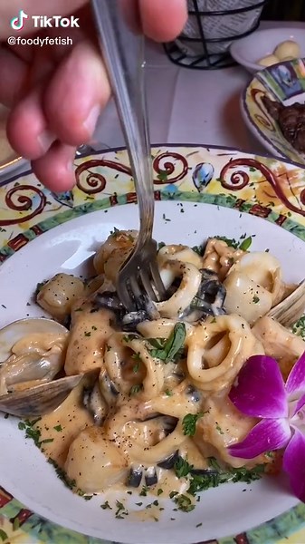 Delicious Squid Ink Pasta Recipe with Clams, Shrimp, and Calamari in Creamy Lobster Sauce