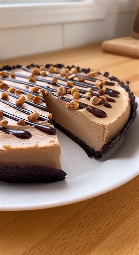 Peanut Butter Chocolate Cool Whip Pie Easy No-Bake Peanut Butter Chocolate Cream Pie Ingredients: 1 cup (240 g) smooth peanut butter 8 oz (225 g) cream cheese, softened 1 cup (120 g) powdered sugar 8 oz (225 g) whipped topping 1 chocolate cookie crust (9-inch / 23 cm) 2 oz (55 g) chocolate, melted 2 tbsp crushed roasted peanuts Directions: In a glass bowl, whisk together the smooth peanut butter, softened cream cheese, and powdered sugar until fully creamy and smooth. Gently fold the whipped top
