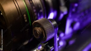 The lens focal length scale rotates with the follow focus gear in close-up. Focus Puller work