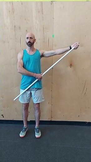 Standing AAROM shoulder abduction with dowel (up to 90°)