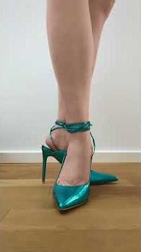 Strappy silver and blue open back high heels with a pointed toe