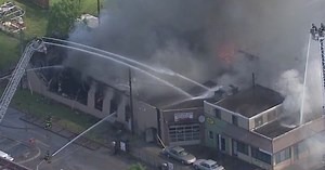 Crews battle massive fire at Windsor building