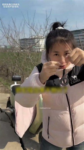 She brought a magnet to retrieve the key... but instead of her own, she found everyone else's