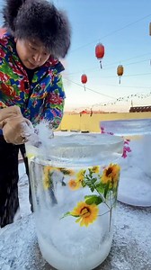 In northeast China, #winter turns the outdoors into a giant natural freezer. Locals handcraft massive ice jars and decorate their frozen walls with flowers. No electricity, no waste — just pure winter wisdom. #ChinaTravel #BetterLife #SpringFestival2026 #YearOfHorse | China Plus Culture