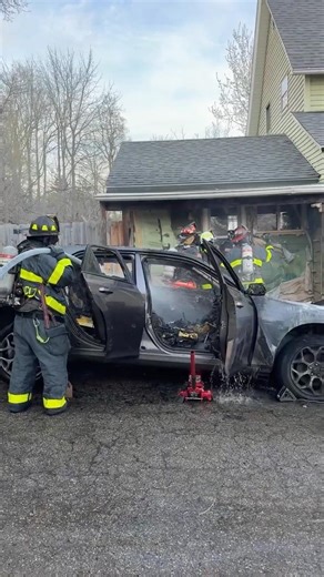 Plainfield Township Michigan on scene vehicle fire next to a house.￼