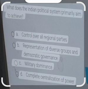 What does the Indian political system primarily aim to achieve?... | Filo