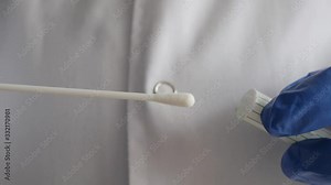 doctor opening a swab, nasal and throat swab