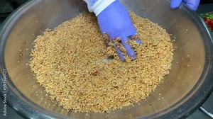 Boiled bulgur grits, close-up. Bulgur porridge, full frame. Bulgur Grains macro