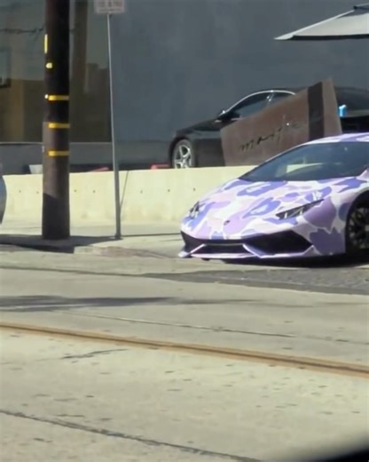 THE CELEBRITY CARS on Instagram: "Travis Scott’s been collecting cars since the beginning of his career. From early Toyotas to a brown-themed fleet and multi-million-dollar hypercars, La Flame’s garage is one of the most legendary in the rap game. 🤎💨 One of his first rides was the 1987 Toyota MR2, he nicknamed the “Hood Toyota,” which even got displayed at a 2016 LA pop-up. That same year, Travis pulled up to ComplexCon with his first Lamborghini — a black Huracán wrapped in Bape