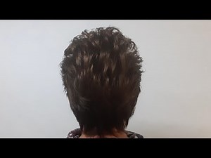 Стрижка до середины уха с пышной макушкой.Haircut to the middle of the ear with a lush crown