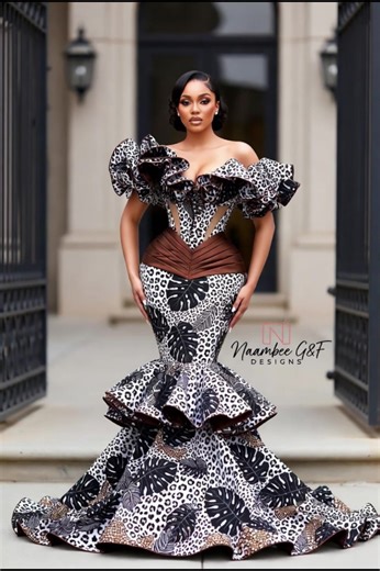 Prints that roar, drama that slays! 🖤🤍🌿 Off-shoulder ruffles, mermaid train for days, and pure Naambee G&F magic. Ready to own every entrance this season. Who’s feeling this bold Ankara energy? Drop a 🔥 if you’d wear it to the next owambe! Atlanta queens, tag your bestie who needs this in her closet! 👑” #AnkaraSlay #MermaidGown #NaijaFashion #AtlantaNaija #OwambeReady Feel free to pair it with the pic or one of these similar bold print mermaid gowns for extra fire: Which detail would you hy