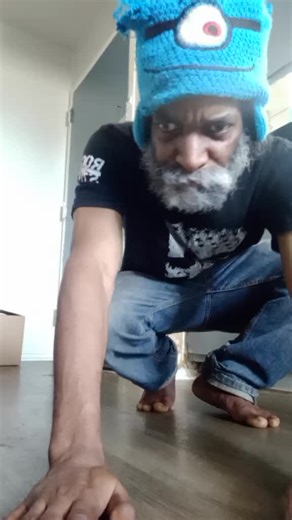 Middle-Aged Man Dancing in a Cartoonish Hat