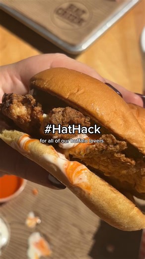 Buffalo lovers, you’re gonna eat this one up. 🔥 Here’s the ultimate #HatHack: Order our Fried Chicken Sandwich, grab a side of ranch and buffalo sauce, drizzle it right over the crispy chicken and prepare to have your mind blown. It’s the perfect mix of tangy, creamy and downright addictive… you might never go back to the original. | Hat Creek Burger Company