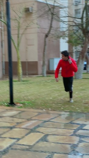Energetic Outdoor Run in Bright Red Puffer Jacket