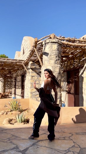 Model Flora - Florencia R Cabral on Instagram‎: "I’ve got my sassy cargos on today 🌚 👖 The ‎أصيلي Multi-way Unisex Cargo in Charcoal grey @asili.eg 📹 Videography @muhammadsaber @nohadnour ✨ 100% Egyptian outfit- cargos @asili.eg - jewelry @bijaarofficial and @shimmer.jewels.eg - top @najlah.eg - shirt by @vaguecollections #cargos #ootd #desert #whitedesert #fayoum #gazymp #blackandwhitedesert #safari #safaritrip #safarioutfit #egyptianbrand"‎