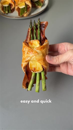 @tastyiri_en on Instagram: "EXPRESS PUFF PASTRY APPETIZER 🤤 INGREDIENTS ▪️ Puff pastry ▪️ Asparagus ▪️ Brie cheese ▪️ Serrano ham ▪️ 1 egg ⏱ 20 minutes | 🌡 375°F 1️⃣ Cut the puff pastry into squares. 2️⃣ Add serrano ham, asparagus and brie cheese to the center. 3️⃣ Drizzle a little honey on top. 4️⃣ Brush the edges with beaten egg. 5️⃣ Bake for 20 minutes at 375°F until golden and crispy. #easyrecipes #appetizerideas #puffpastryrecipes #holidayappetizers #quickrecipes partyfood"