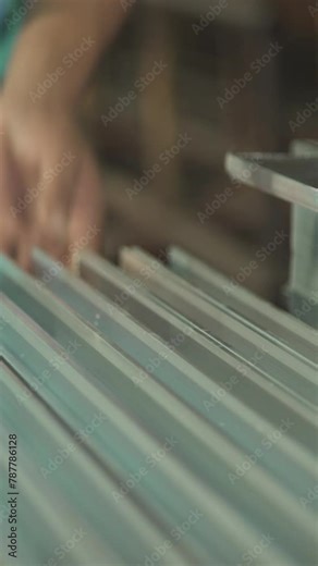 Precision Measurement of Metal Workpiece Using Vernier Caliper in Industrial Setting