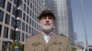 Free stock video - Man wearing military uniform