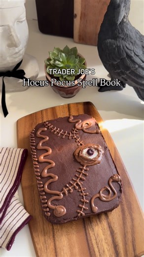 Amanda Hernandez on Instagram: "Hocus Pocus spell book cake hack 🧹📖👀 If you’re hosting this Halloween and want a fun and festive treat this spell book cake hack is so quick and easy! It’s no secret that I love doing fun cake hacks with the Trader Joe’s mini sheet cakes - they are the best! Hocus Pocus is such a classic that I knew I had to create a fun treat inspired by the movie. My girls recently watched Hocus Pocus for the first and loved it so much that they flipped out when they saw I cr