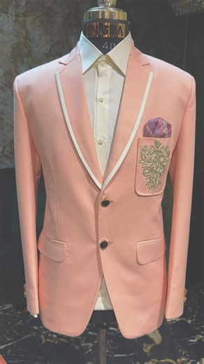 Enigma Xclusive on Instagram: "Pastel perfection with a royal touch of handwork. @enigma.xclusive 9160160322.8977864560. A peach tux crafted for men who prefer class in soft tones and luxury in the details. Clean white trimming, signature hand-embroidery, and a royal pocket square—subtle yet unforgettable.” #PeachTux #PastelMenswear #LuxuryOutfits #EnigmaXclusive #GroomFashion #HandEmbroidery #CustomTux #DesignerMenswear #PastelStyle #PremiumFashion"