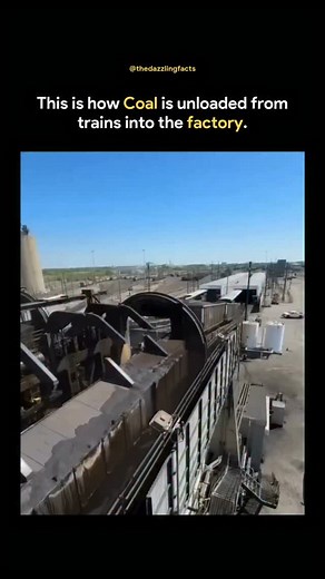 The Dazzling Facts™ on Instagram: "Coal is unloaded from trains through a fascinating process. The train pulls into a designated area where a massive rotating cage called a rotary dumper - awaits. The entire train car is then flipped upside down within this cage, allowing coal to pour out through bottom doors. Next, the coal falls onto a conveyor belt system transporting it directly into the factory for processing. Finally, the empty train car is returned to its original position and the process
