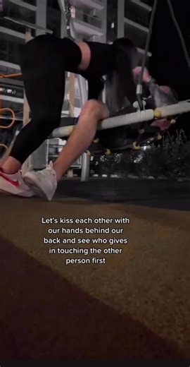 Playful Kiss Game: Touch Challenge with Hands Behind Back