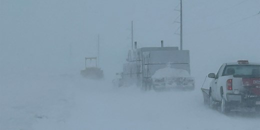 What makes a blizzard different from an ordinary snowstorm?