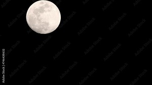 Moon Timelapse, Stock time lapse : Full moon rise in dark nature sky, night time. Full moon disk time lapse with moon light up in night dark black sky. High-quality free video footage or timelapse