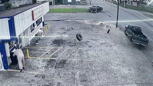 Video captures moment pedestrian nearly hit by wheel that flew off truck involved in wreck