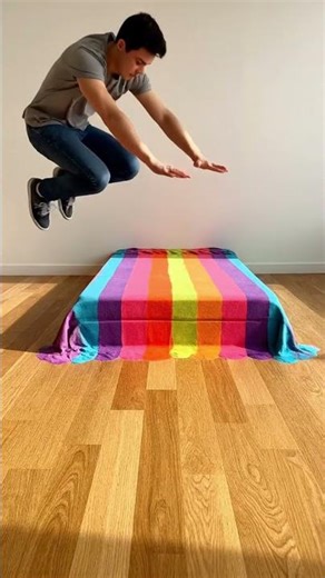 The most satisfying bed jump you'll see today 🌈🛏️ #ASMR