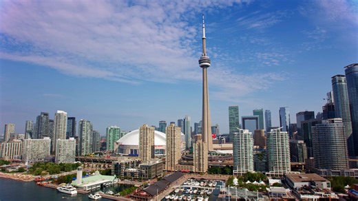 CN Tower's grandeur from above: Lake Ontario to cityscape - Worldwide
