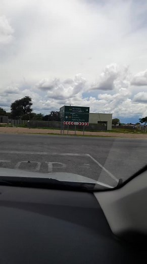 Road Signs and Scenic Drive in Namibia
