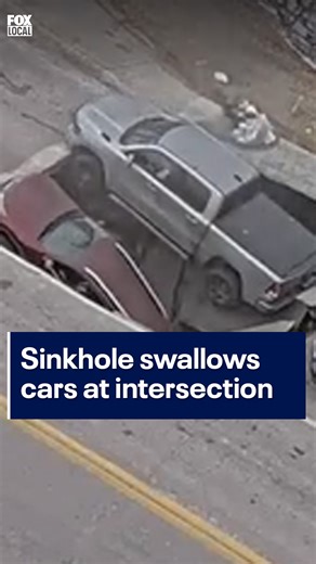 A massive sinkhole opened at an Omaha intersection, swallowing two vehicles that were stopped at a traffic light, though no injuries were reported. Bystanders rushed to help the drivers to safety and directed traffic away from the scene. Click the link in our bio for more on this story. #viral #sinkhole #caughtoncamera #nebraska #fox10phoenix | FOX 10 Phoenix